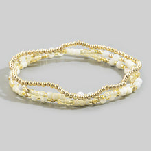 Load image into Gallery viewer, Shell Bead And Gold Stretch Layered Bracelet Set