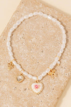 Load image into Gallery viewer, Floral Ceramic Heart And Bow Charms Pearl Beaded Bracelet