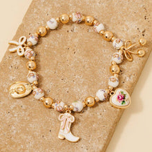 Load image into Gallery viewer, Western And Heart Charms Floral Ceramic Beaded Bracelet