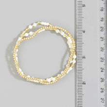 Load image into Gallery viewer, Shell Bead And Gold Stretch Layered Bracelet Set