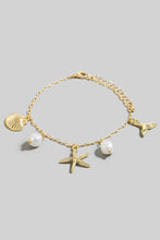 Load image into Gallery viewer, Whale Tail Clam Starfish and Pearl Bracelet
