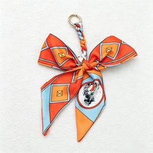 Load image into Gallery viewer, CouldNook Red Series Bow Bag Charm - Soft Bag Accent
