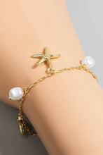 Load image into Gallery viewer, Whale Tail Clam Starfish and Pearl Bracelet
