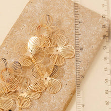 Load image into Gallery viewer, Metallic Floral Triangle Earrings

