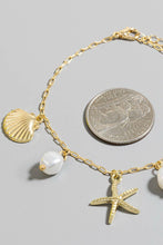 Load image into Gallery viewer, Whale Tail Clam Starfish and Pearl Bracelet
