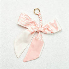 Load image into Gallery viewer, CouldNook Red Series Bow Bag Charm - Soft Bag Accent
