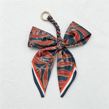 Load image into Gallery viewer, CouldNook Red Series Bow Bag Charm - Soft Bag Accent
